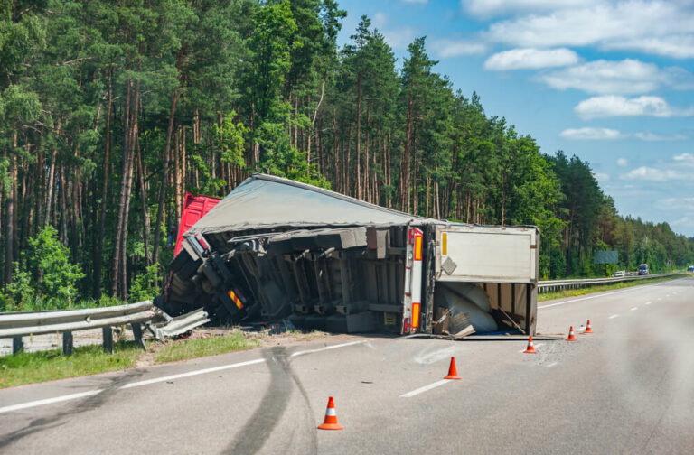 Rollover truck on road